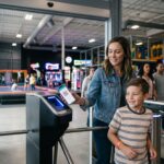 Attraction ticketing software: guests scanning tickets at the entrance of an entertainment venue